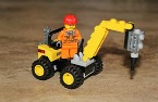 Lego figure driving a construction vehicle.jpg